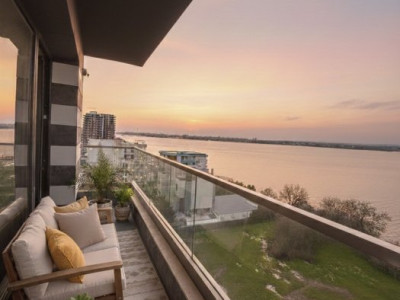 Locuinta aparte cu  apusuri pe lac 